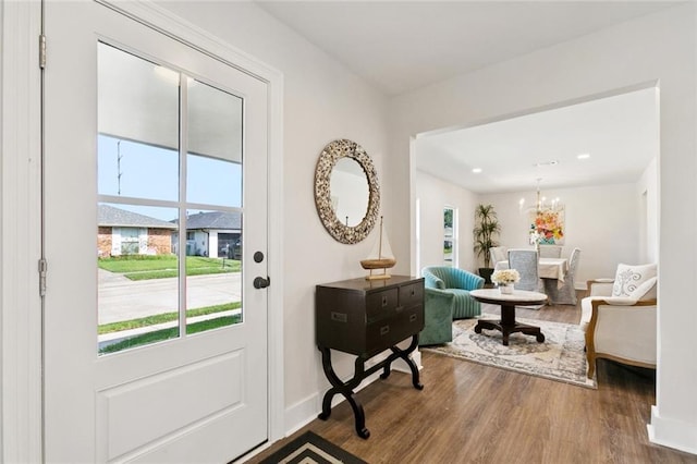 1109 Manson St, Metairie, LA 70001 - entrance foyer featuring plenty of natural light, wood finished floors, a chandelier, and recessed lighting