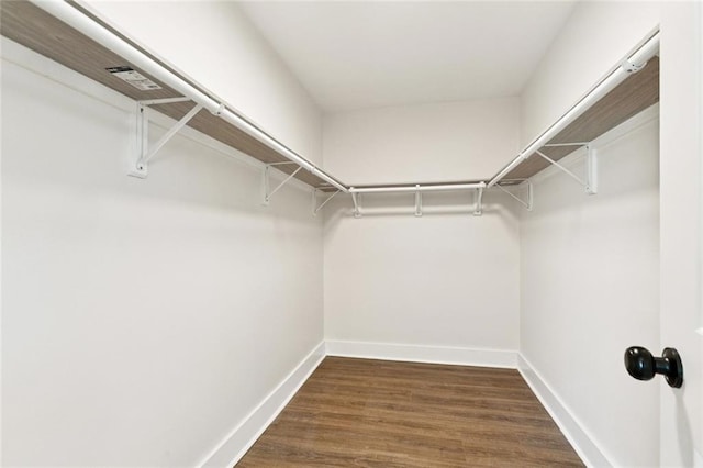 1109 Manson St, Metairie, LA 70001 - walk in closet with wood finished floors