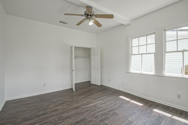 425 Park Blvd, New Orleans, LA 70114 - unfurnished bedroom with dark wood-style flooring, beamed ceiling, a closet, and ceiling fan