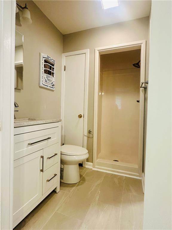 8732 25th St, Metairie, LA 70003 - bathroom with vanity and a shower