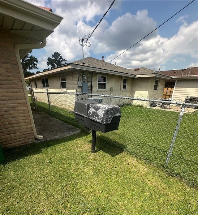 8732 25th St, Metairie, LA 70003 - back of property with brick siding and a shingled roof
