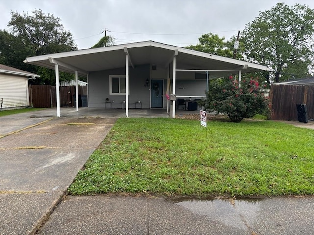 1905 Farmington Pl, Gretna, LA 70056 - view of front of house with driveway and an attached carport