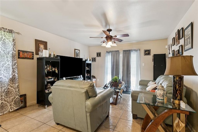484951 Viola St, New Orleans, LA 70126 - living area featuring light tile patterned floors and a ceiling fan
