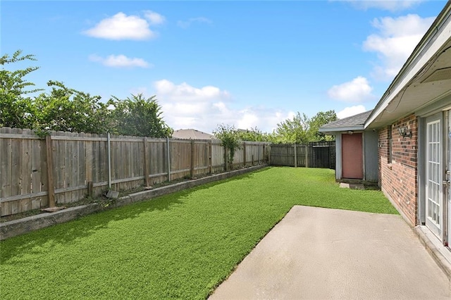 484951 Viola St, New Orleans, LA 70126 - fenced backyard with a patio