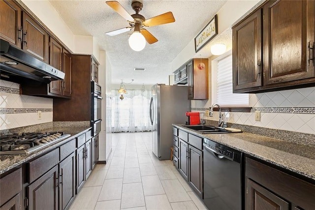 3125 Metairie Ct, Metairie, LA 70002 - kitchen featuring black appliances, range hood, dark brown cabinetry, a textured ceiling, and tasteful backsplash