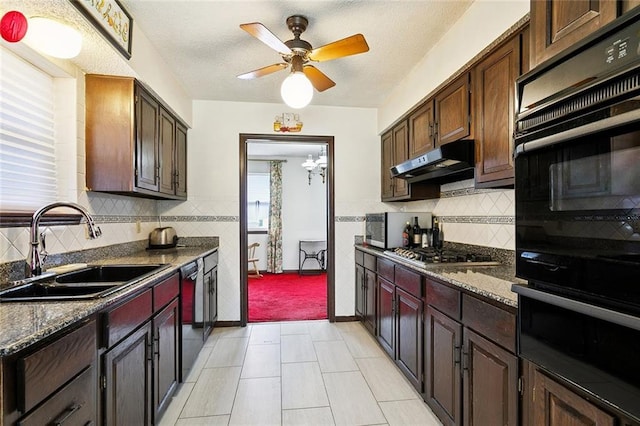 3125 Metairie Ct, Metairie, LA 70002 - kitchen with black appliances, under cabinet range hood, a ceiling fan, and decorative backsplash