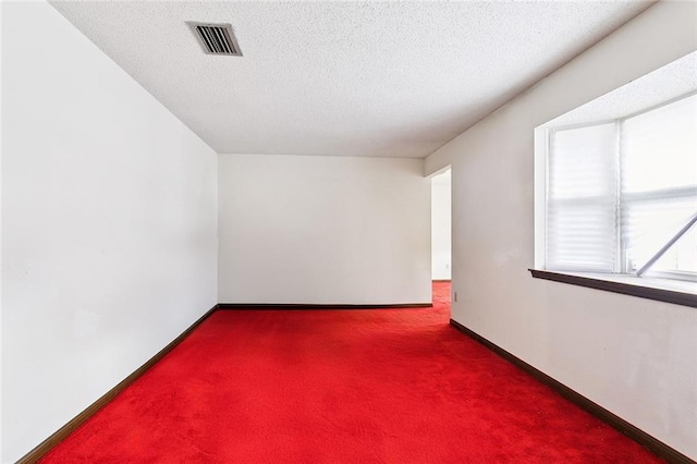 3125 Metairie Ct, Metairie, LA 70002 - spare room featuring carpet flooring and a textured ceiling