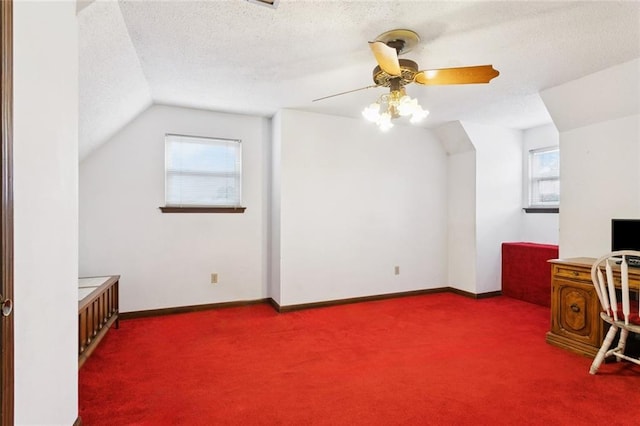 3125 Metairie Ct, Metairie, LA 70002 - bonus room with carpet flooring, a ceiling fan, a textured ceiling, vaulted ceiling, and a desk