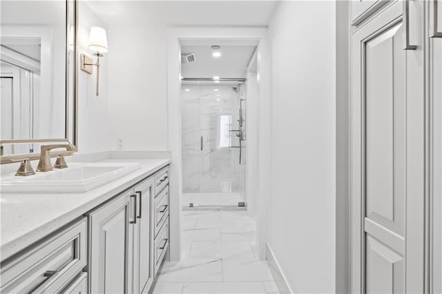 300 Lake Marina Ave Unit 7-C, New Orleans, LA 70124 - bathroom with marble look tiles, a marble finish shower, vanity, and recessed lighting