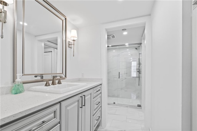 300 Lake Marina Ave Unit 7-C, New Orleans, LA 70124 - full bath with marble look tiles, a marble finish shower, vanity, and recessed lighting
