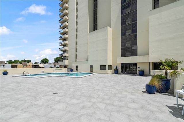 300 Lake Marina Ave Unit 7-C, New Orleans, LA 70124 - community pool featuring a patio