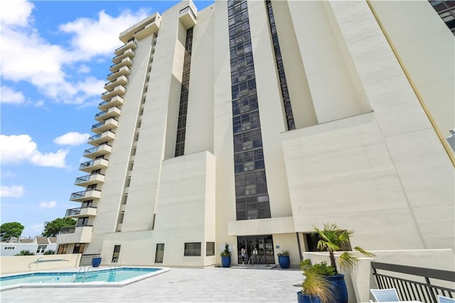 300 Lake Marina Ave Unit 7-C, New Orleans, LA 70124 - view of property featuring a community pool