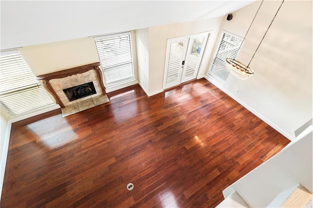 26 Chamale Cv Unit 26, Slidell, LA 70460 - unfurnished living room featuring wood-type flooring and a premium fireplace