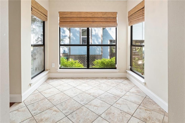 26 Chamale Cv Unit 26, Slidell, LA 70460 - unfurnished sunroom featuring tile patterned flooring