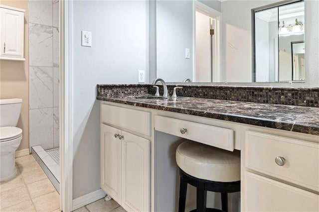 26 Chamale Cv Unit 26, Slidell, LA 70460 - full bathroom featuring vanity, a stall shower, and tile patterned flooring