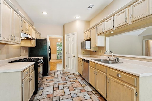 418 Westwood Dr, Mandeville, LA 70471 - kitchen featuring black range with gas stovetop, stainless steel dishwasher, under cabinet range hood, white microwave, and light countertops