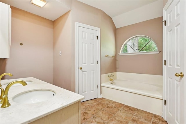 418 Westwood Dr, Mandeville, LA 70471 - bathroom featuring a garden tub and double vanity