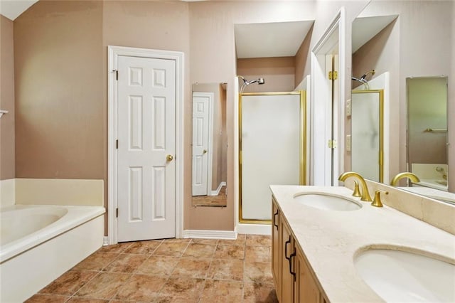 418 Westwood Dr, Mandeville, LA 70471 - bathroom with a garden tub, a shower stall, and double vanity