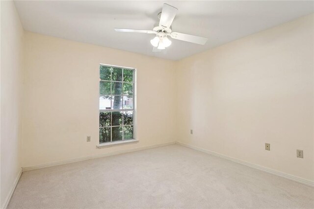 418 Westwood Dr, Mandeville, LA 70471 - spare room featuring carpet and a ceiling fan