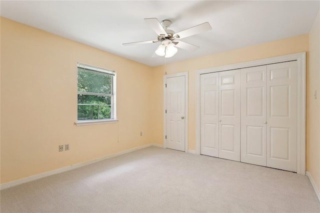 418 Westwood Dr, Mandeville, LA 70471 - unfurnished bedroom with carpet, a closet, and a ceiling fan