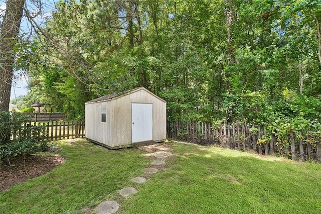 418 Westwood Dr, Mandeville, LA 70471 - view of shed featuring a fenced backyard
