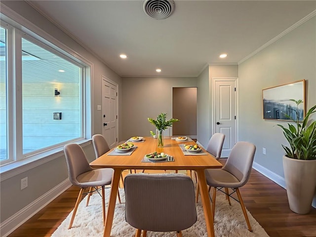 861 W William David Pkwy, Metairie, LA 70005 - dining area featuring dark wood-style floors, ornamental molding, and recessed lighting