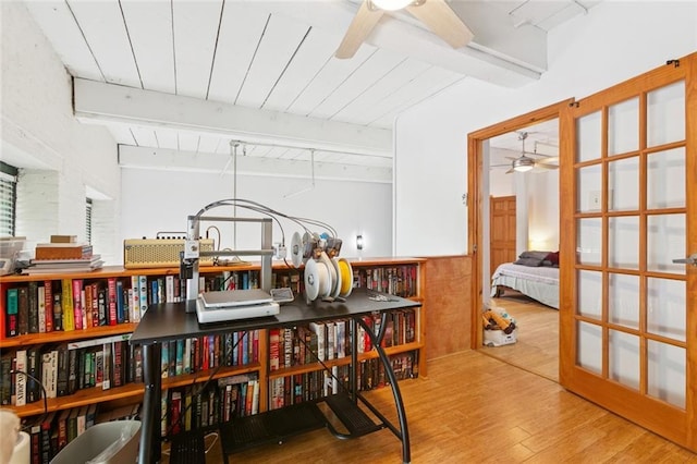 920 Poeyfarre St Unit 326, New Orleans, LA 70130 - living area with ceiling fan, wood finished floors, and a wood ceiling with exposed beams