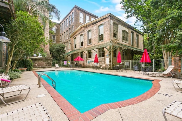 920 Poeyfarre St Unit 326, New Orleans, LA 70130 - community pool featuring a patio area