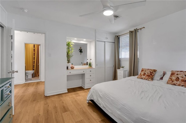 4430 Karen Ave, Jefferson, LA 70121 - bedroom featuring light wood-type flooring, a closet, ceiling fan, and an office area