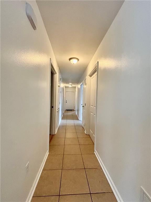 70330 C St, Covington, LA 70433 - hallway with light tile patterned floors