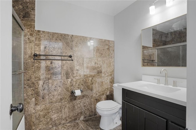 4218 Hessmer Ave Unit 217, Metairie, LA 70002 - bathroom featuring a shower with shower door and vanity