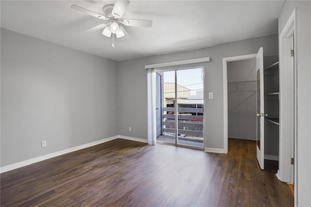 4218 Hessmer Ave Unit 217, Metairie, LA 70002 - unfurnished bedroom featuring wood finished floors, a spacious closet, ceiling fan, and access to outside