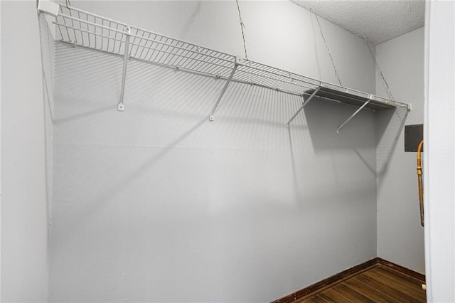 4218 Hessmer Ave Unit 217, Metairie, LA 70002 - spacious closet with dark wood-style floors