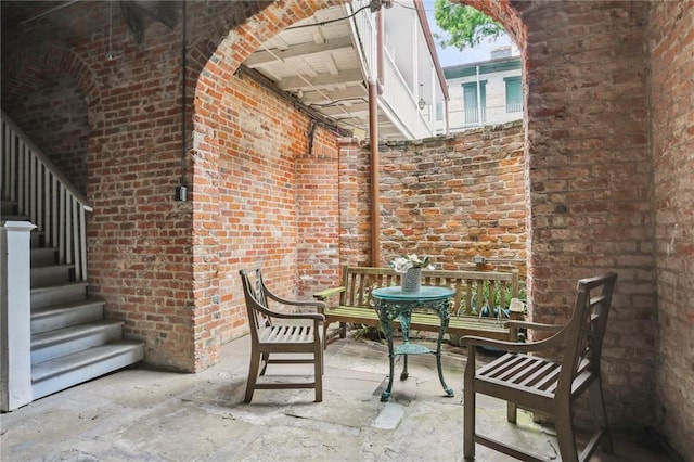 1133 Royal St Unit 7, New Orleans, LA 70116 - view of patio / terrace with stairway