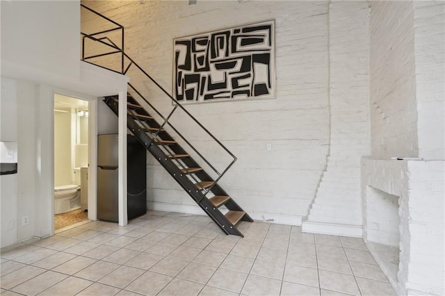 1133 Royal St Unit 7, New Orleans, LA 70116 - stairway featuring tile patterned flooring