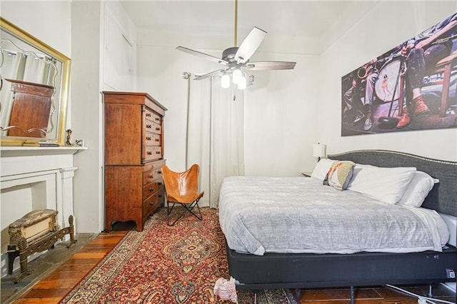 1821 Urquhart St, New Orleans, LA 70116 - bedroom with wood finished floors and a ceiling fan
