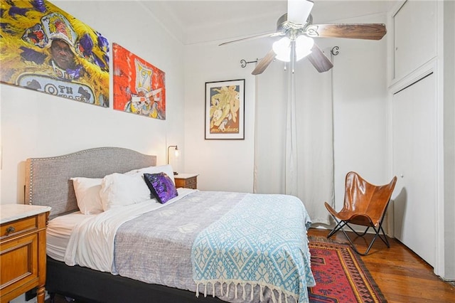 1821 Urquhart St, New Orleans, LA 70116 - bedroom with wood finished floors and ceiling fan