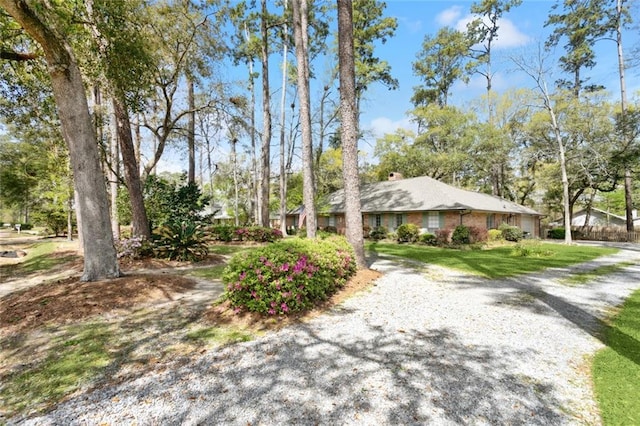 124 N Dr, Covington, LA 70433 - ranch-style home featuring a chimney