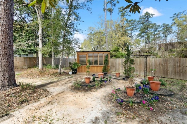 124 N Dr, Covington, LA 70433 - fenced backyard with an exterior structure and an outdoor structure