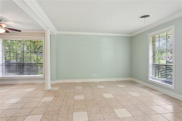 124 N Dr, Covington, LA 70433 - spare room featuring decorative columns, healthy amount of natural light, crown molding, a ceiling fan, and light tile patterned floors