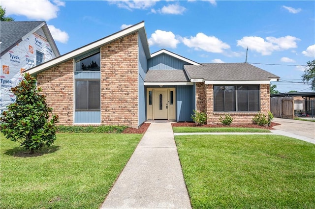 1701 Cambridge Dr, La Place, LA 70068 - mid-century modern home with brick siding and roof with shingles