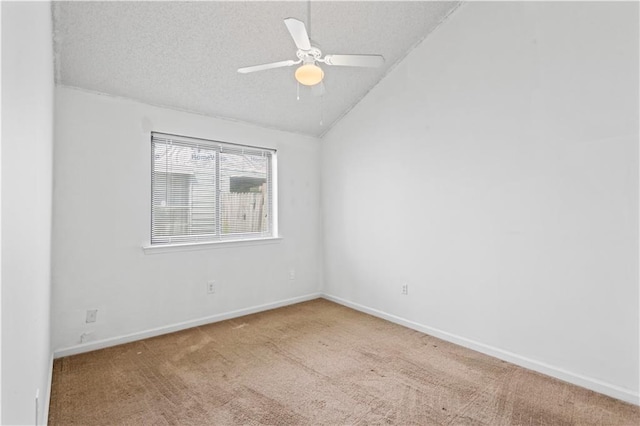 1701 Cambridge Dr, La Place, LA 70068 - unfurnished room featuring carpet, a textured ceiling, lofted ceiling, and ceiling fan