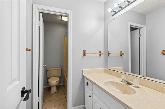 1701 Cambridge Dr, La Place, LA 70068 - bathroom featuring vanity, tile patterned flooring, a textured ceiling, and washtub / shower combination
