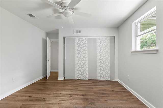 513 Roseland Pkwy, Harahan, LA 70123 - unfurnished bedroom with wood finished floors and ceiling fan