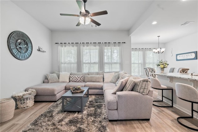 16168 S Trace Ext, Ponchatoula, LA 70454 - living area with a chandelier, light wood-type flooring, a ceiling fan, and recessed lighting