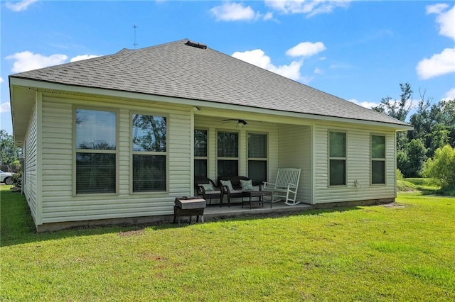 16168 S Trace Ext, Ponchatoula, LA 70454 - back of house featuring a patio, a lawn, and a shingled roof