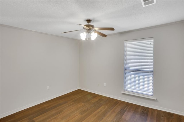 640 Tete Lours Dr Unit 1, Mandeville, LA 70471 - spare room featuring a ceiling fan, wood finished floors, a textured ceiling, and crown molding