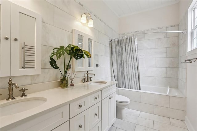827 Port St, New Orleans, LA 70117 - bathroom with tiled shower / bath combo and double vanity