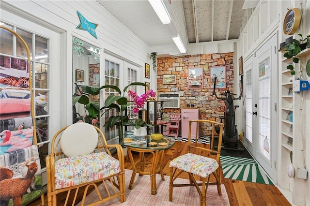 827 Port St, New Orleans, LA 70117 - sunroom with french doors and a wood stove