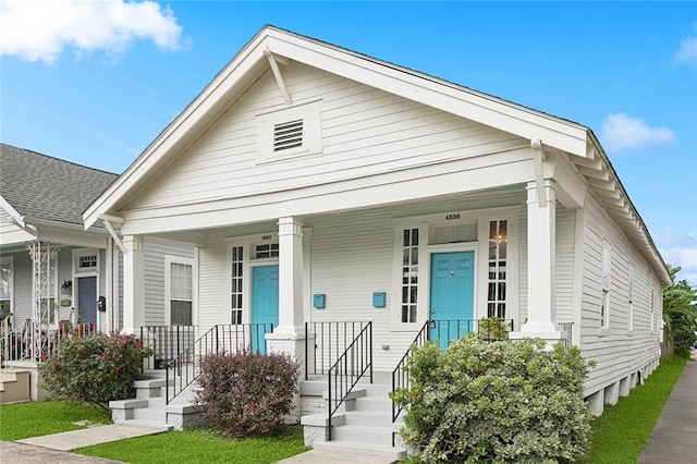4528-30 Baudin St, New Orleans, LA 70119 - view of front facade featuring a porch